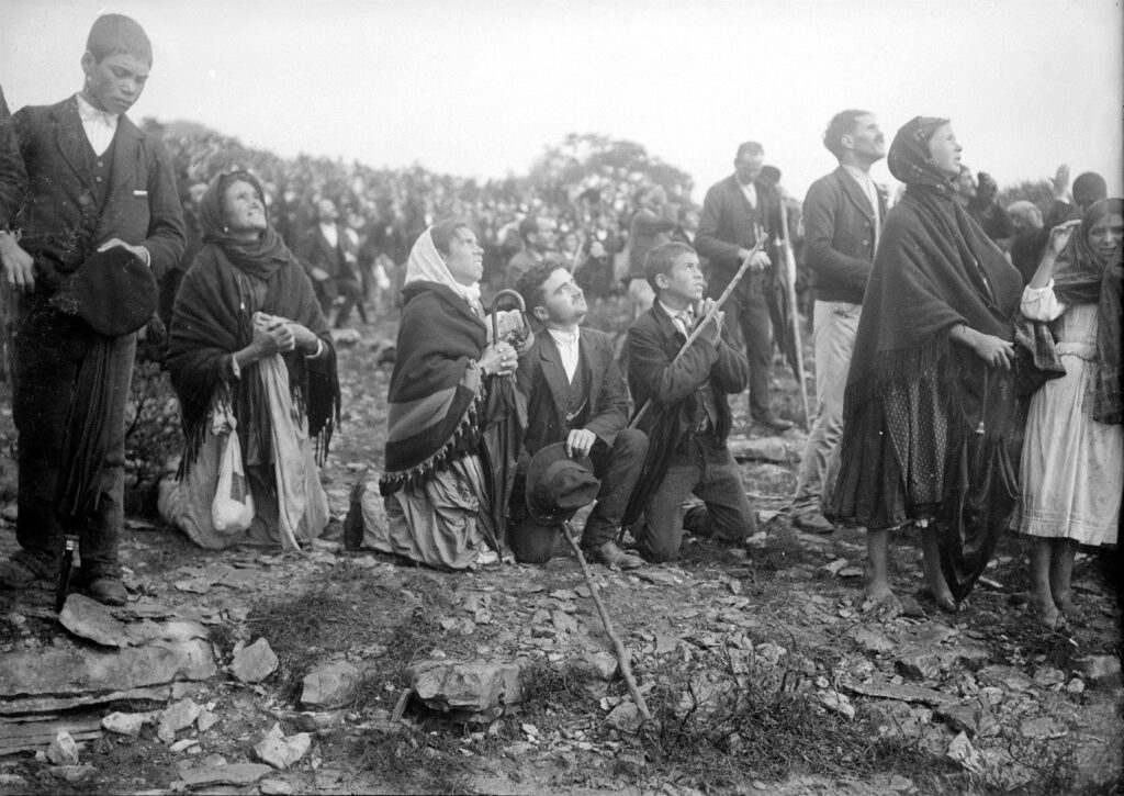 The crowd looking at "the Miracle of the Sun", occurred during the Our Lady of Fatima apparitions.